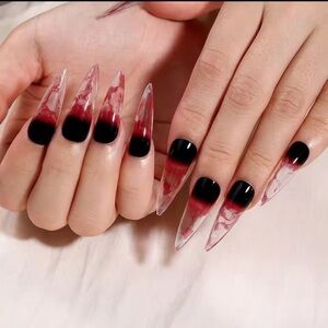 Stiletto Shaped Blood Spatter Acrylic Nails in Black Clear Red